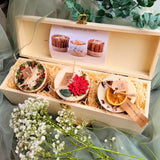 Gift Set 3 Winter Small Candles in wooden wine box open view showing three decorated candles nestled in natural wood shavings